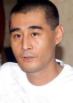 傅东育