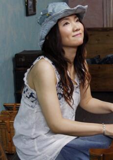 小峰理纱